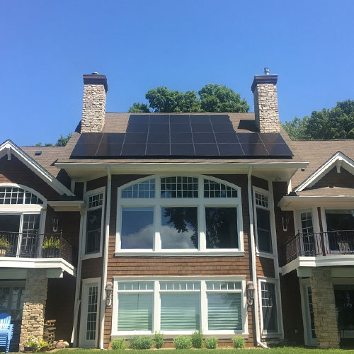 A home with solar panels on the roof.