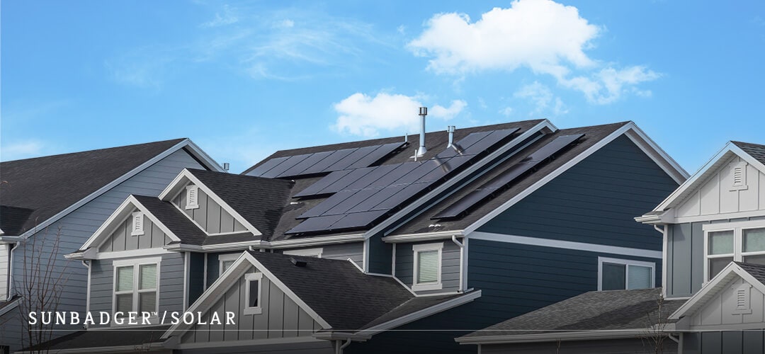 Home with black solar panels on roof to show solar panel size